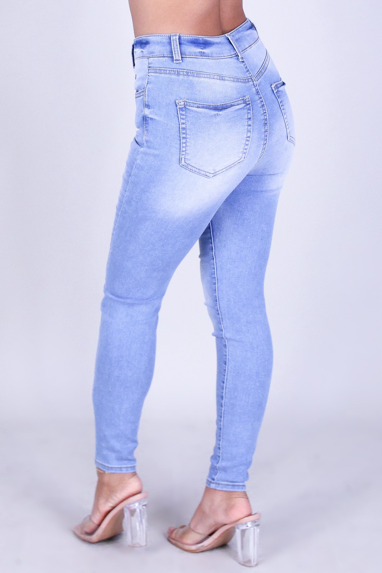 CURVE HUGGER SKINNY JEANS