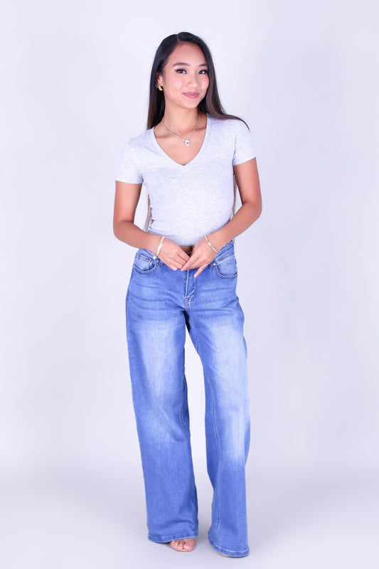 EVERY GIRL NEEDS THIS TEE