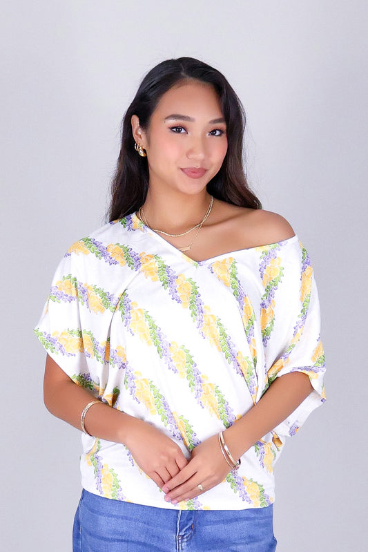 TWISTED LEI DOLMAN TOP