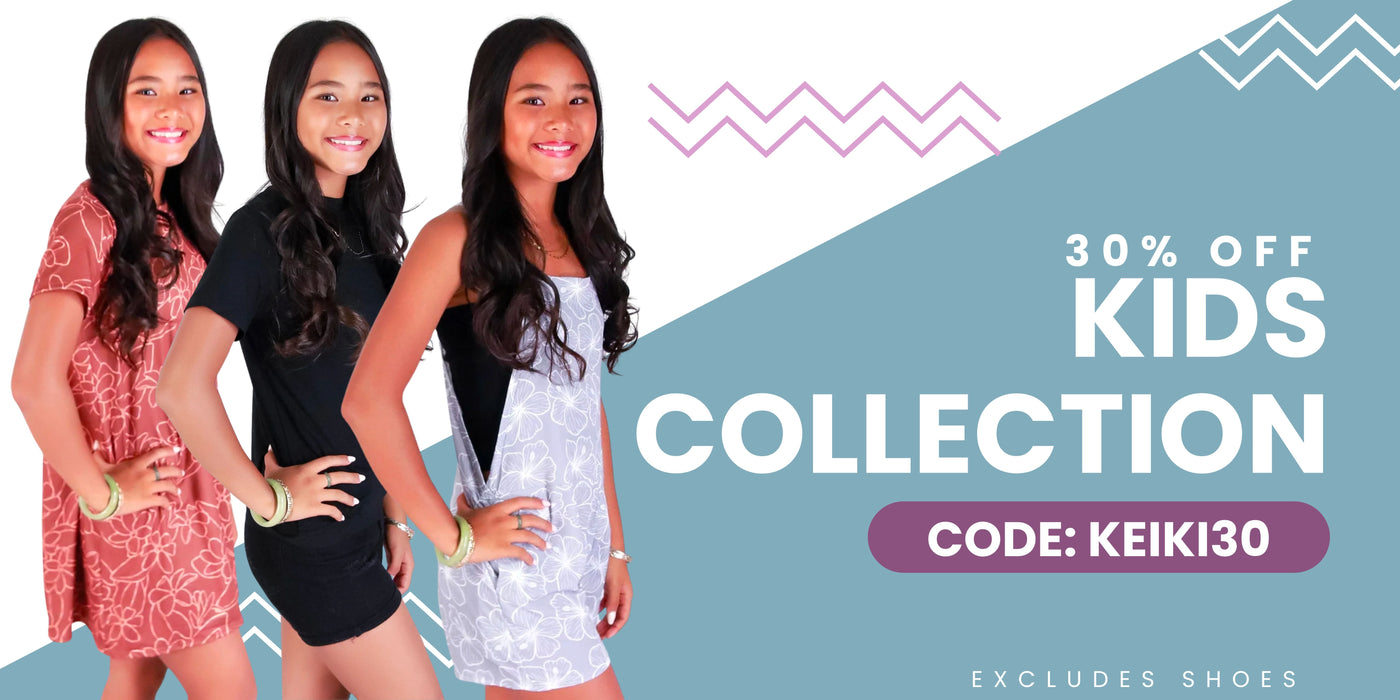 Three young women posing with a promotional banner for a kids' clothing collection sale. 30% off kids collections, excluding shoes. Use Code: KEIKI30