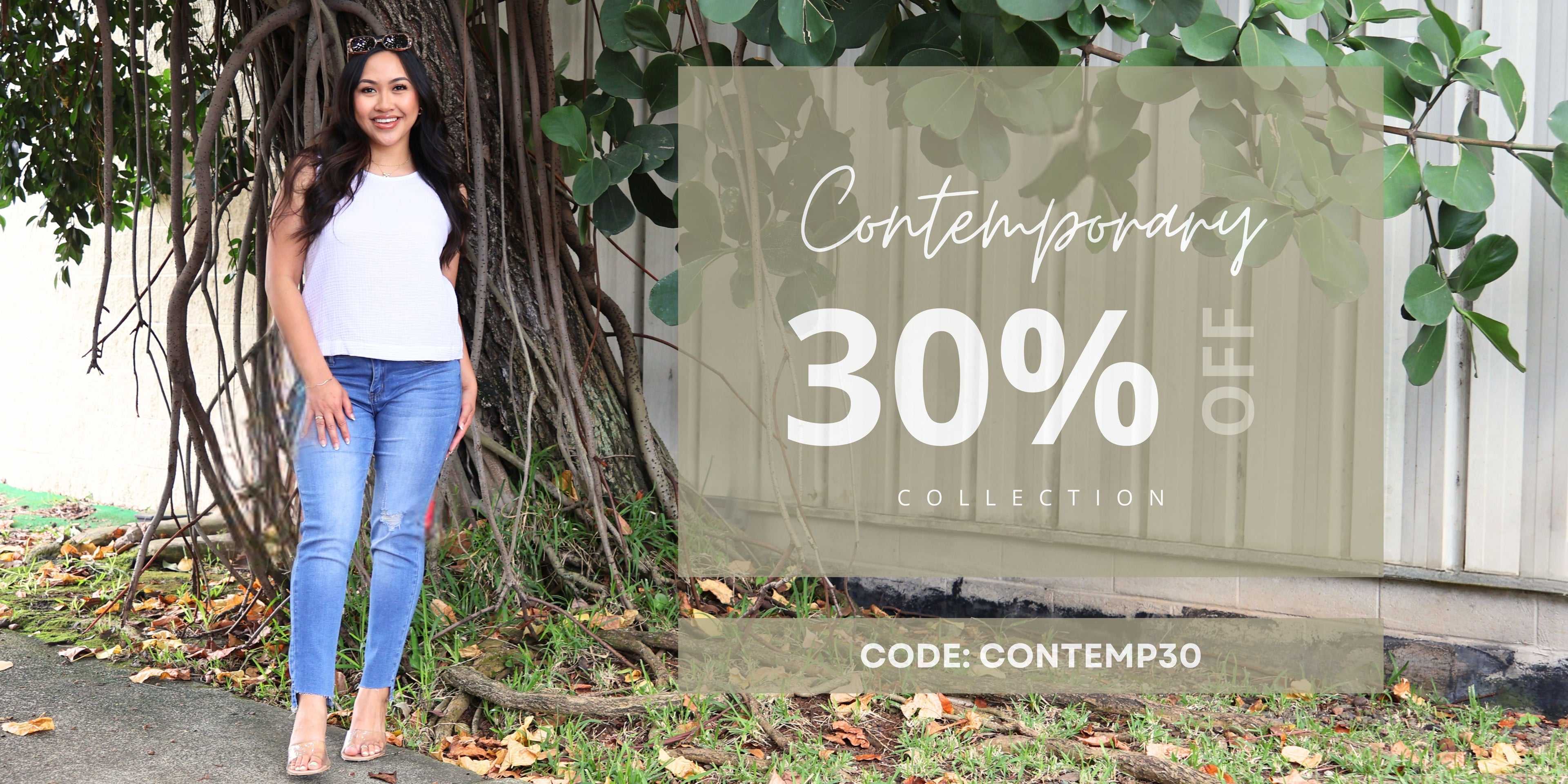 Woman standing outdoors with a promotional banner for a 30% off contemporary collection. Use Code: CONTEMP30