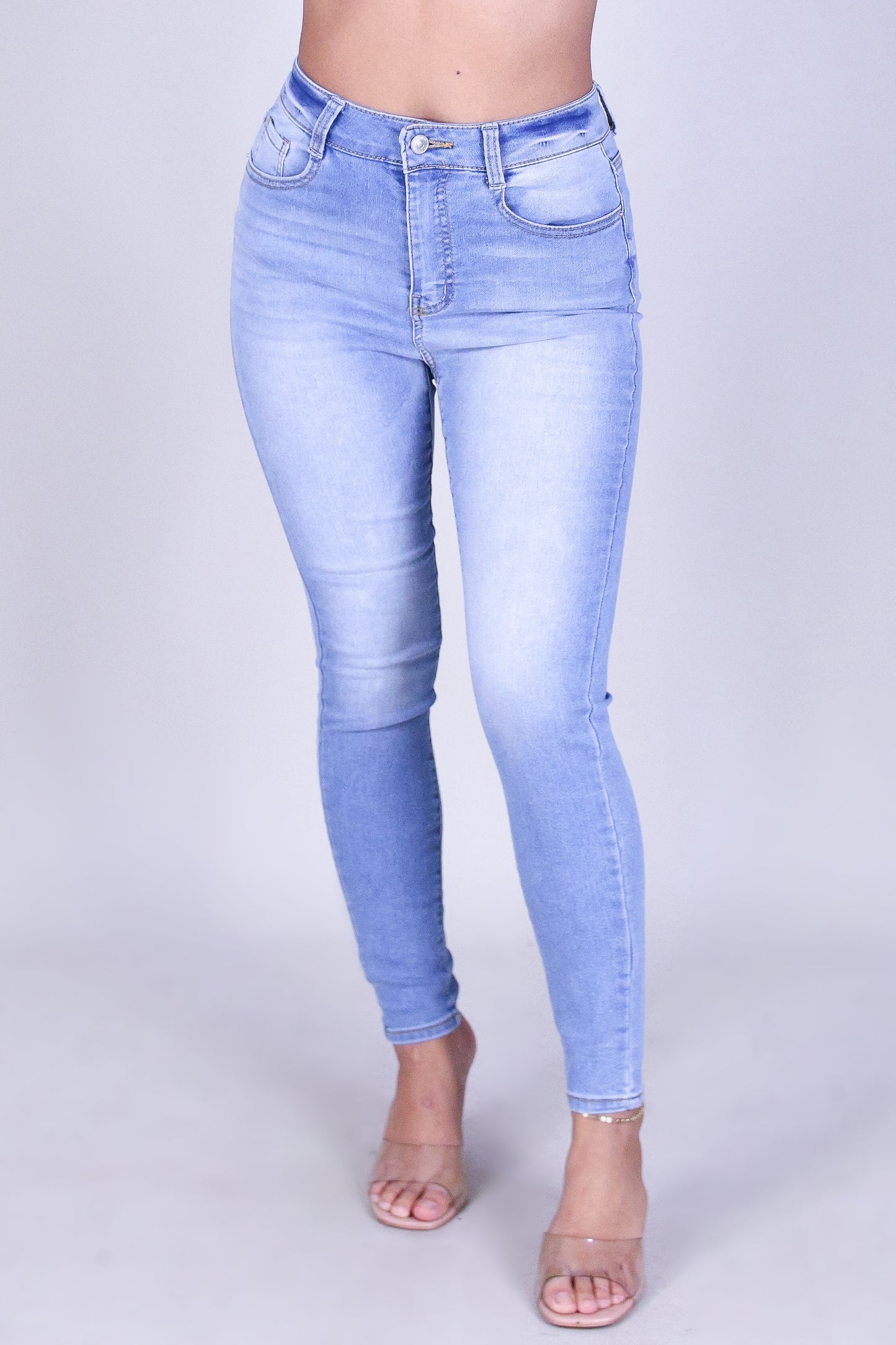 CURVE HUGGER SKINNY JEANS
