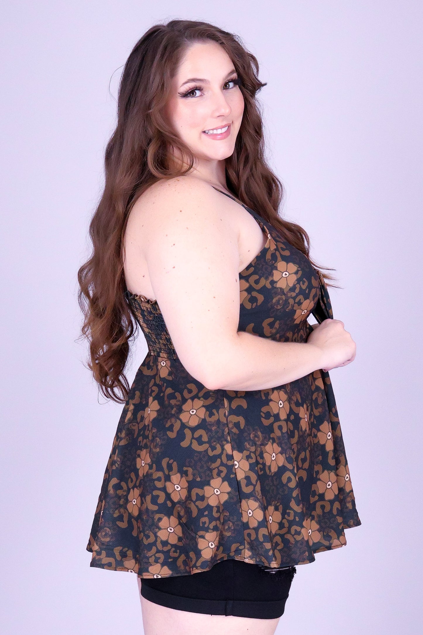 WILD PUAKENIKENI PEPLUM TOP