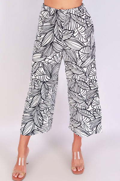Jeans Warehouse Hawaii - PRINT WOVEN CAPRI'S - PETAL PRETTY CAPRI PANTS | By PAPERMOON/ B_ENVIED