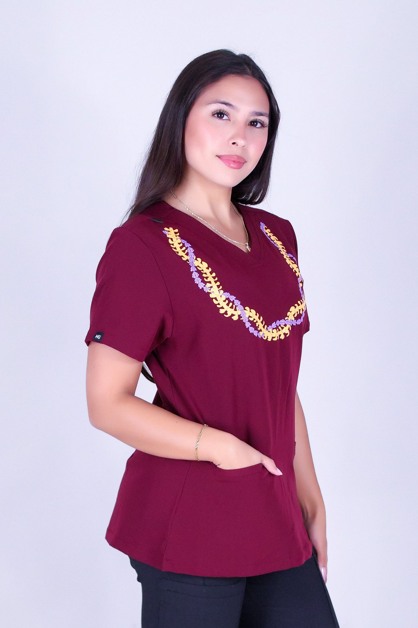 PUAKENIKENI CROWN FLOWER SCRUB TOP
