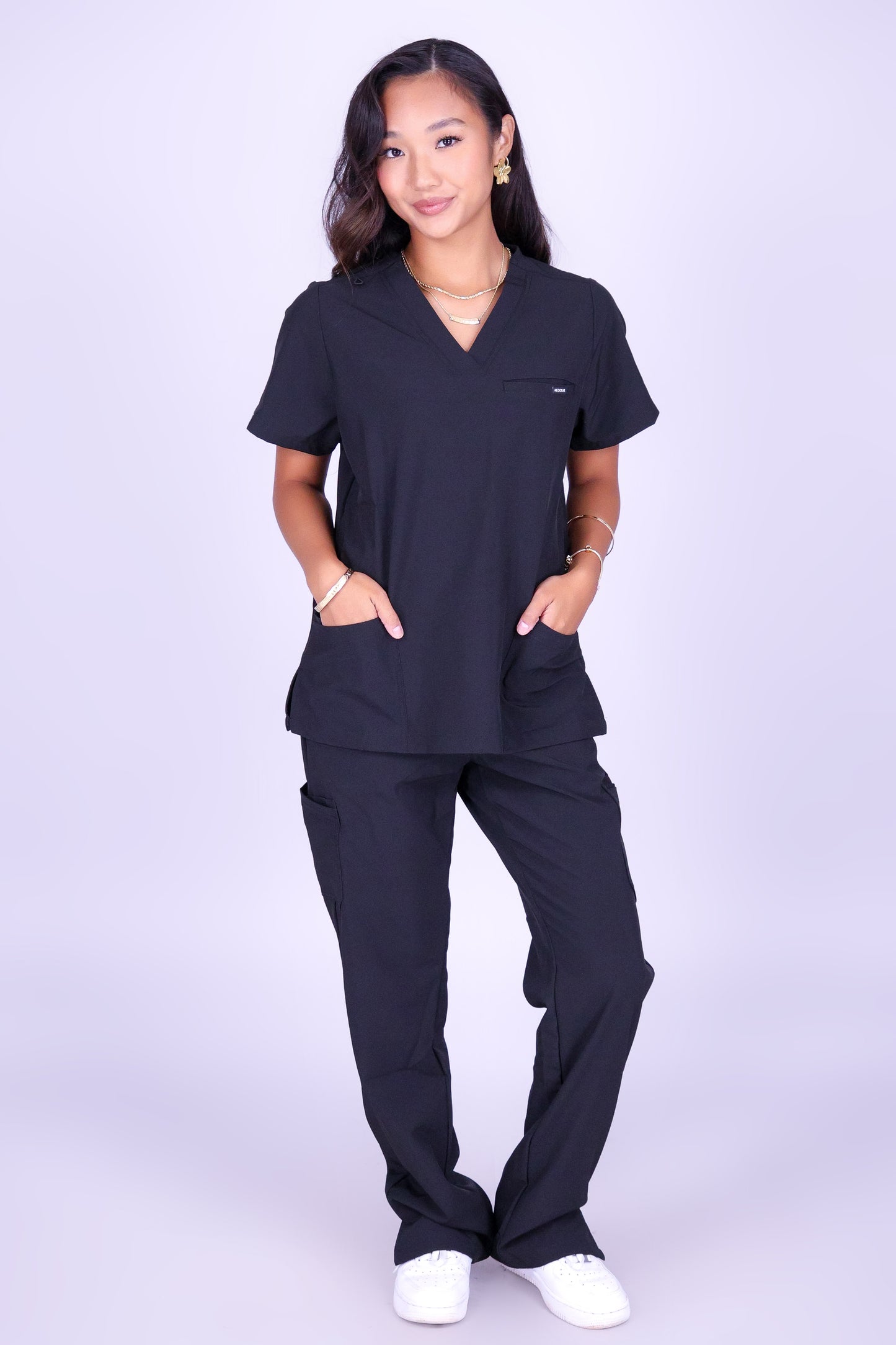 MOTION SCRUB TOP