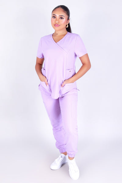 WORKING OVER TIME SCRUB TOP