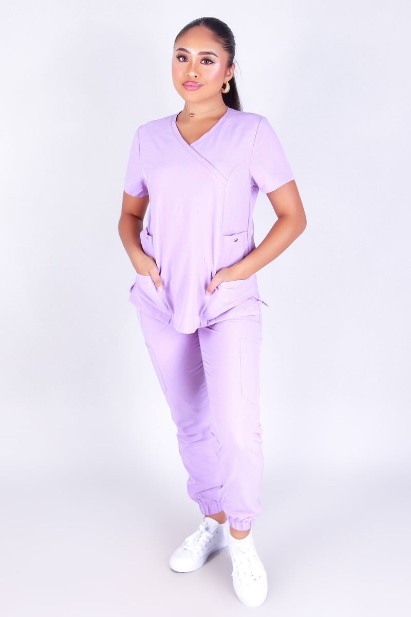 WORKING OVER TIME SCRUB TOP