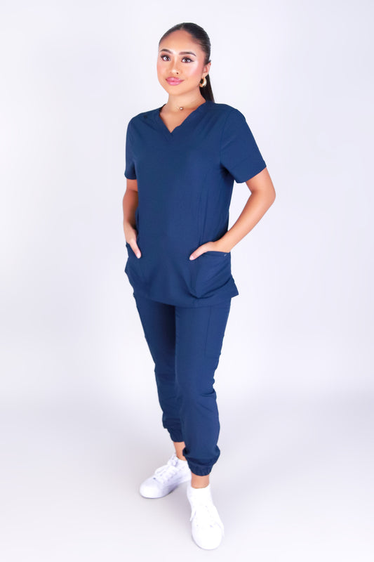 BACK AT IT SCRUB TOP