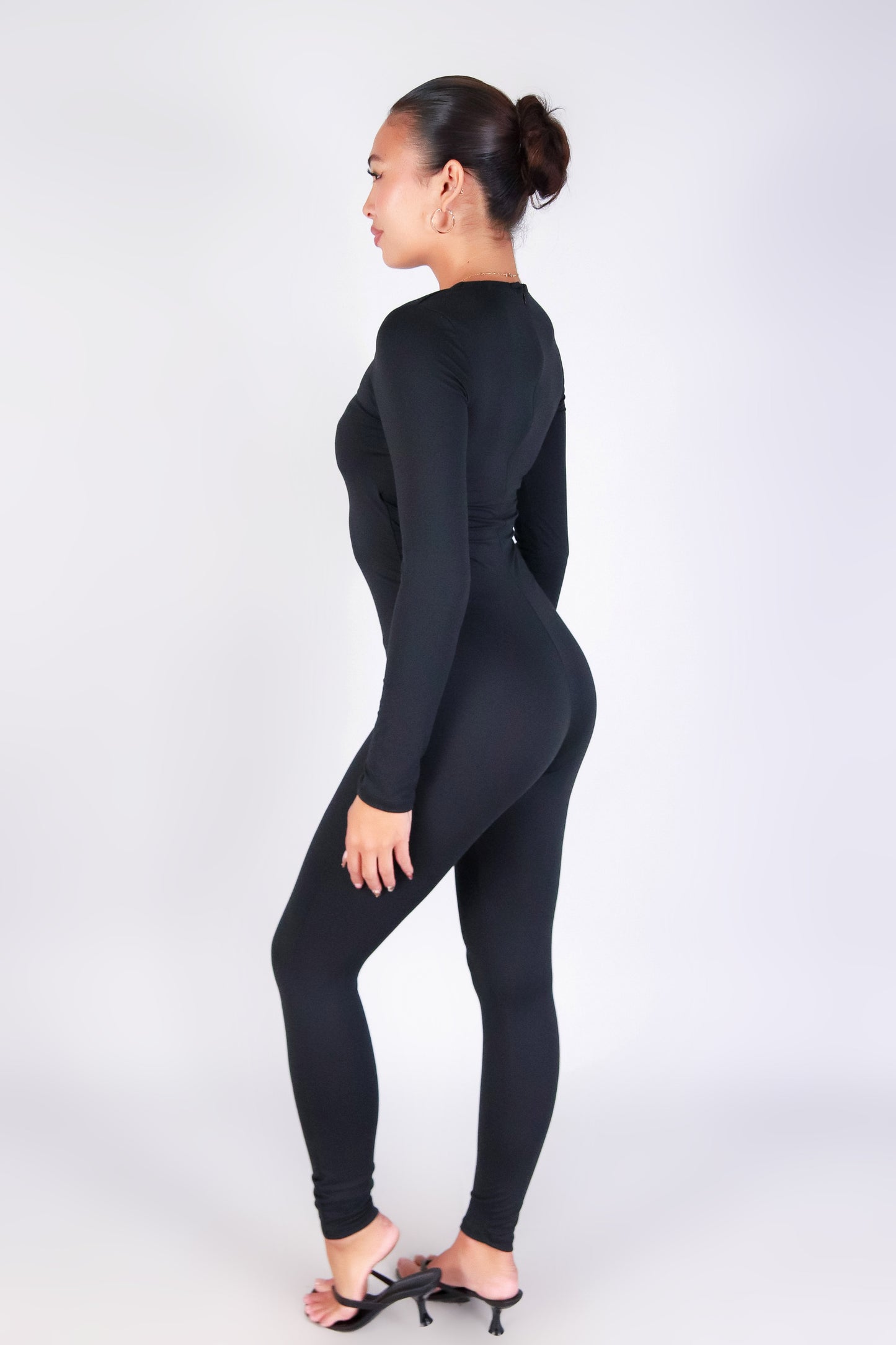 BABE IN BLACK CATSUIT JUMPSUIT