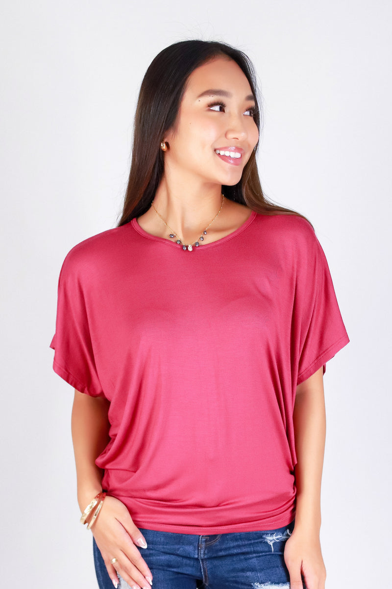 CALLING OUT DOLMAN TOP