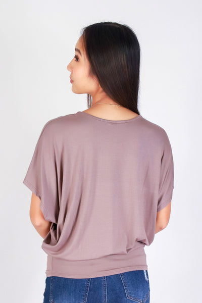 CALLING OUT DOLMAN TOP