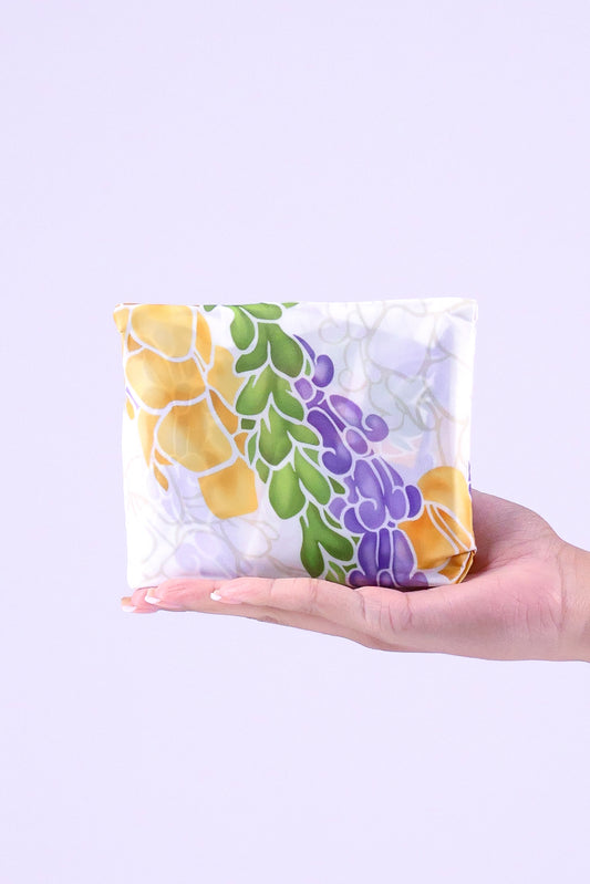 TWISTED LEI FOLDABLE BAG