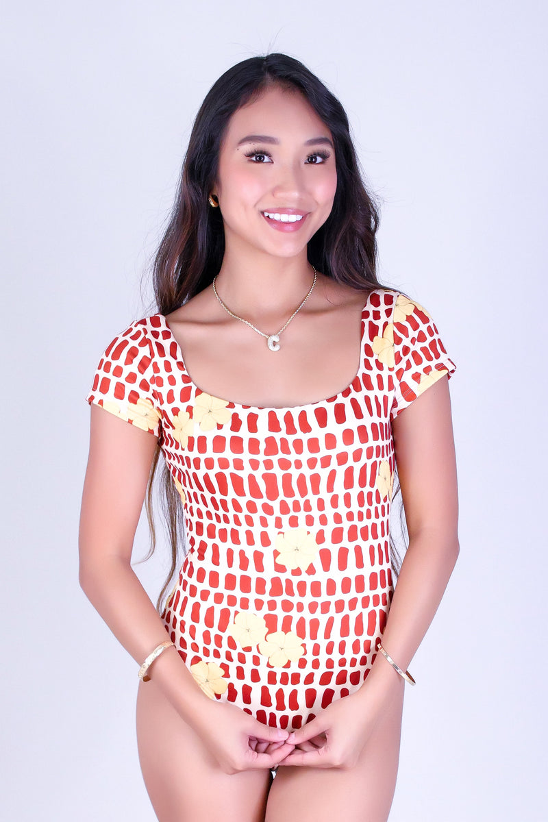 PUAKENIKENI MITER SHELL BODYSUIT