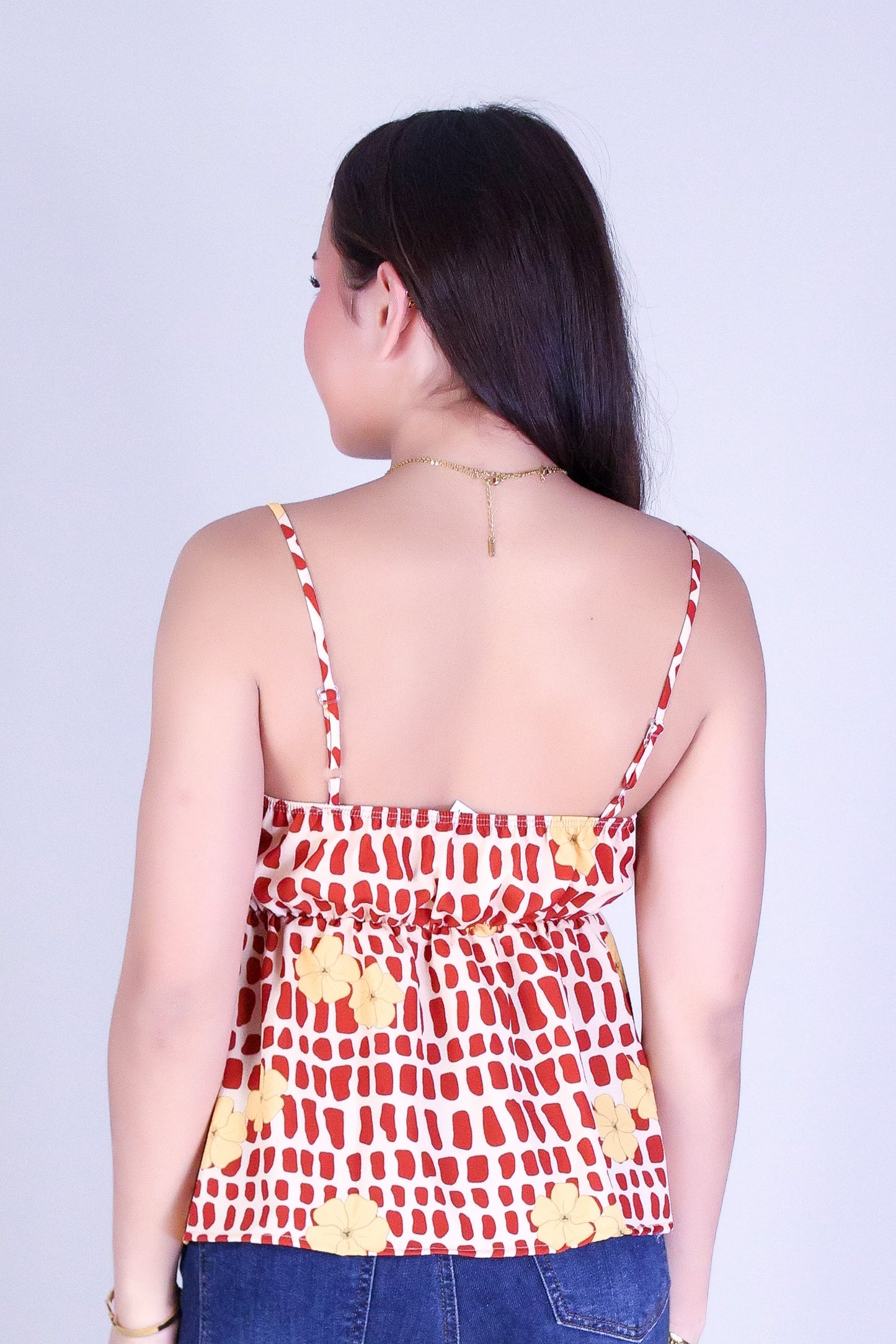 PUAKENIKENI MITER SHELL TWIST CHEST TOP