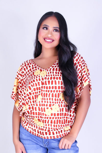 PUAKENIKENI MITER SHELL DOLMAN TOP