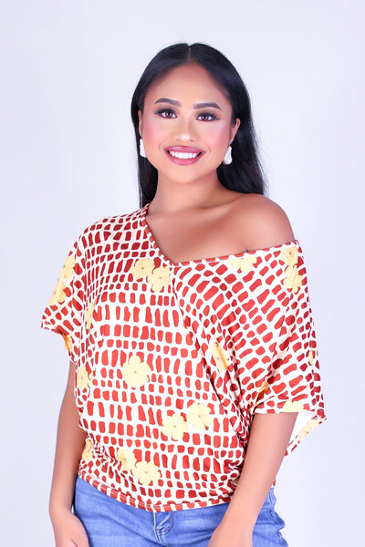 PUAKENIKENI MITER SHELL DOLMAN TOP