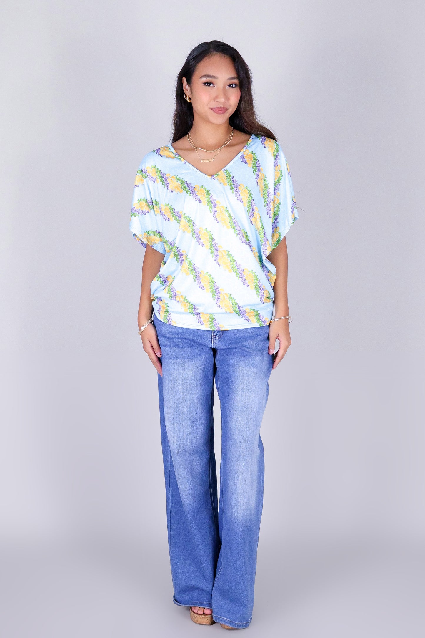 TWISTED LEI DOLMAN TOP