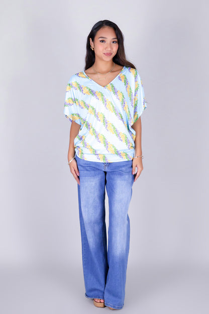 TWISTED LEI DOLMAN TOP