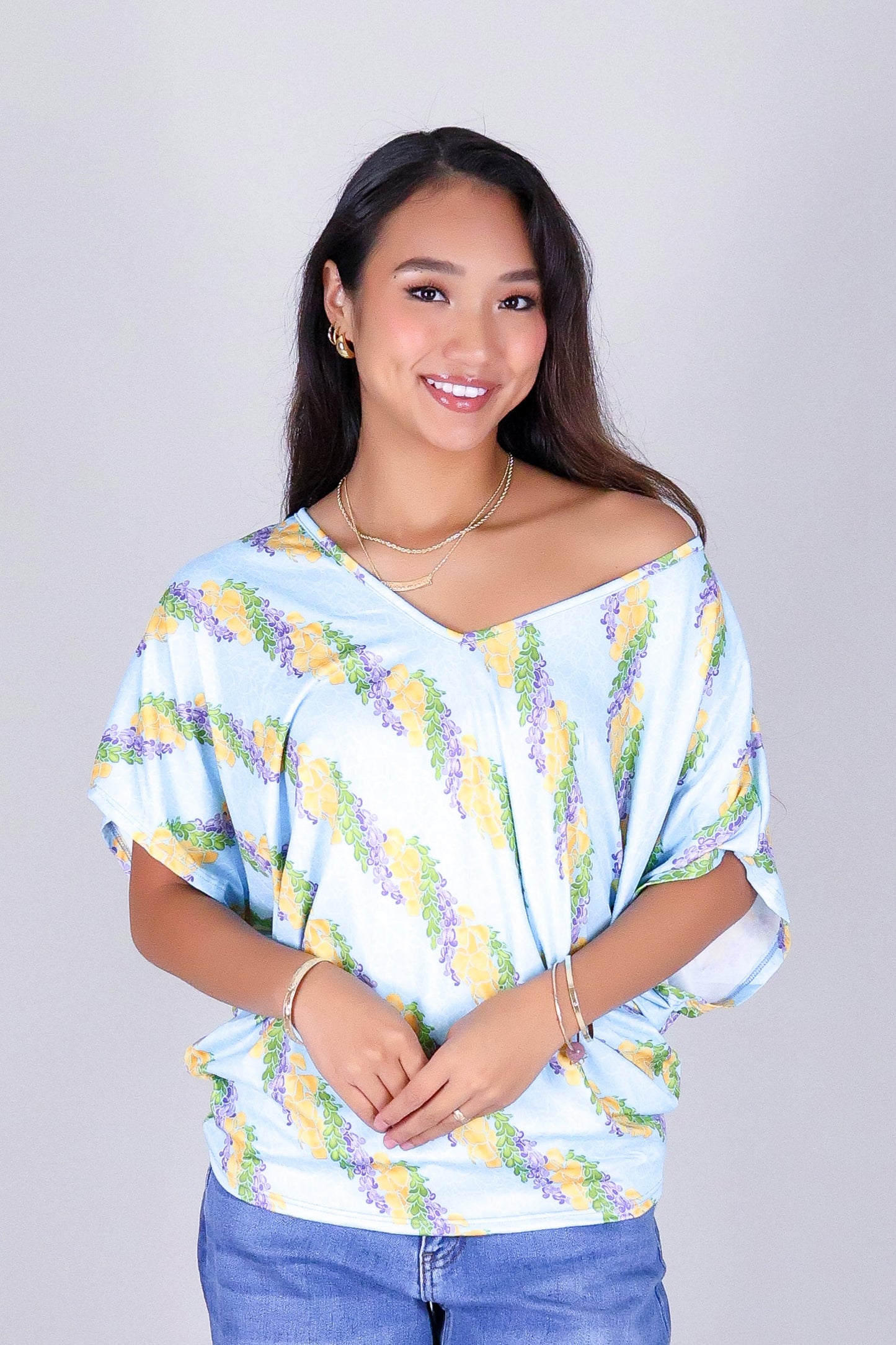 TWISTED LEI DOLMAN TOP