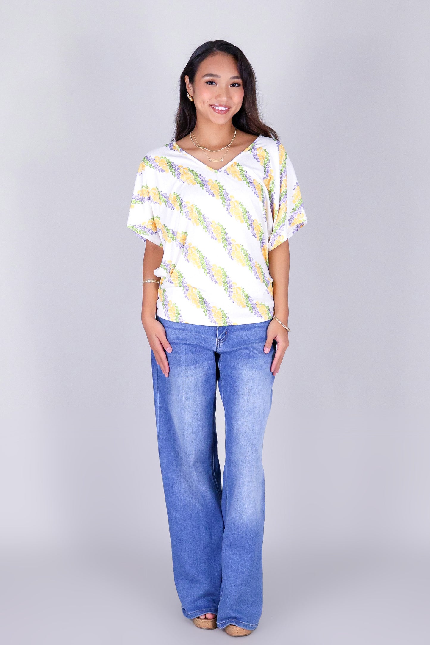 TWISTED LEI DOLMAN TOP