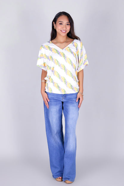 TWISTED LEI DOLMAN TOP