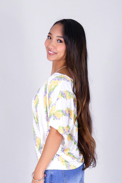 TWISTED LEI DOLMAN TOP