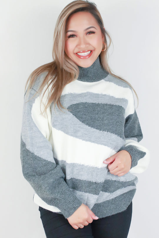 MOCK NECK ABSTRACT SWEATER