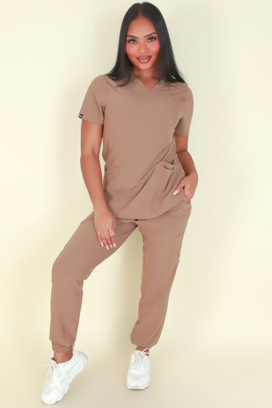 BACK AT IT SCRUB TOP