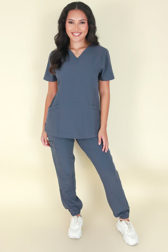 BACK AT IT SCRUB TOP