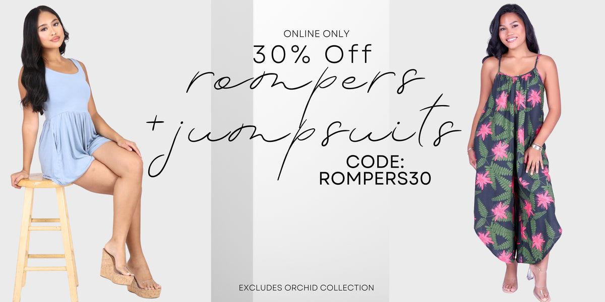 Promotional banner for an online sale offering rempers and jumpsuits, featuring a model in a light blue sleeveless romper sitting on a wooden stool on the left, and a model in a green and pink tropical floral jumpsuit on the right. The center features text reading '30% Off rempers + jumpsuits' with a discount code 'ROMPERS30'.